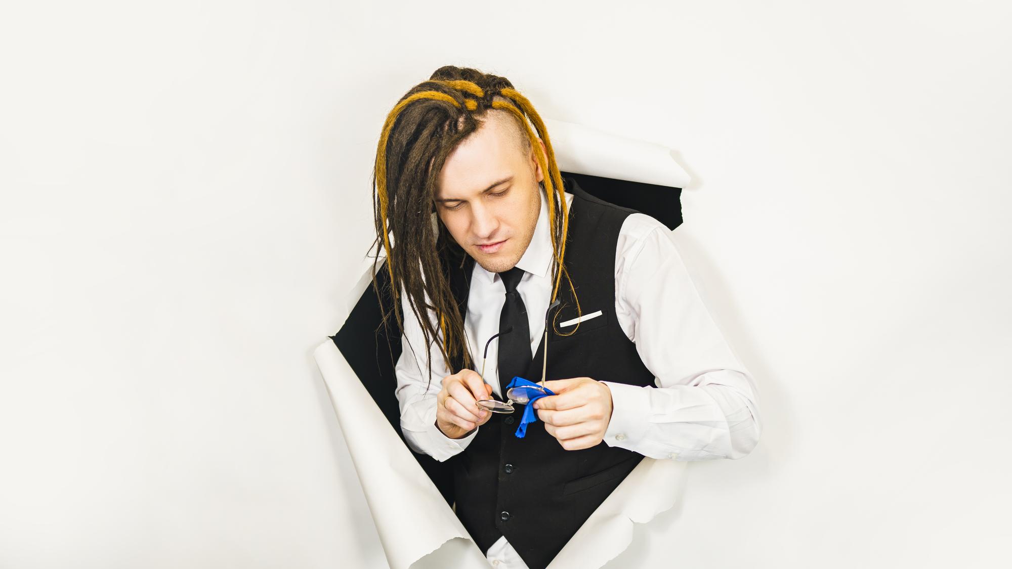 portrait of technical tutor demonstrating stitches